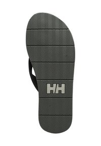 Černá gumová podešev žabek se zigzagovým vzorem, s šedým logem ve středu. Texturovaná pro lepší grip a stabilitu.