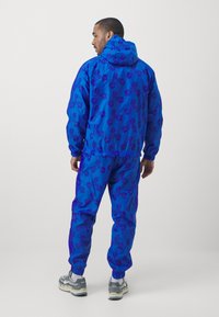 Nike Performance FRANCE FFF TRACK SUIT HOODED - National team wear - royal blue/bright blue/club gold