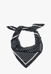 Czarna jedwabna chusta w białe kropki z bia�łą obwódką, luźno złożona, z dwoma końcami związanymi w supeł.