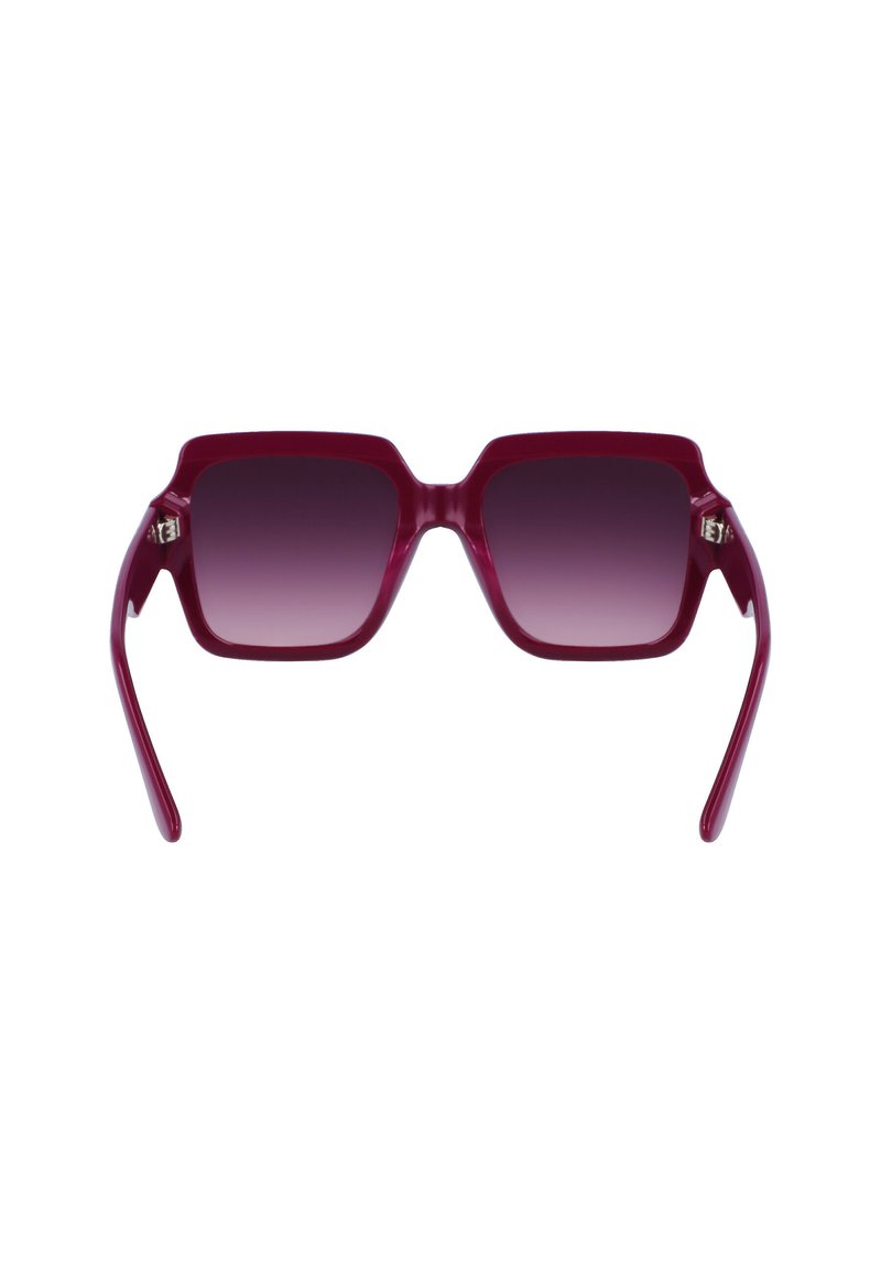 Gafas de sol cuadradas de plástico marrón oscuro con lentes ahumados en degradado. Brazos elegantes con detalles sutiles, que ofrecen un diseño moderno.