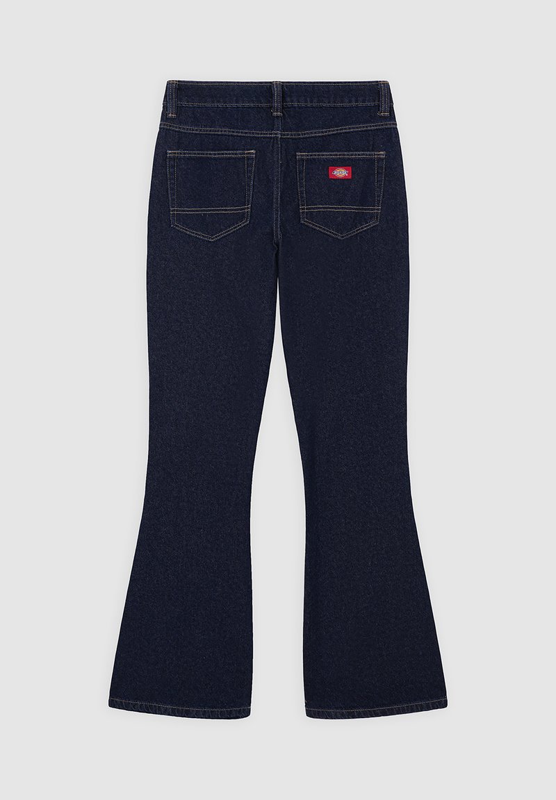 Dark blue flared jeans with a smooth texture, featuring two back pockets, contrasting stitching, and a small red logo label on the waistband.