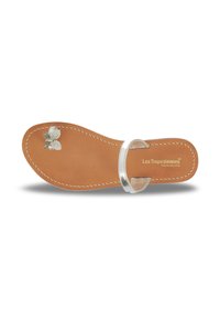Leather sandal with a brown sole, silver strap, and decorative butterfly accent, featuring white stitching along the edges.