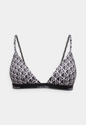 Soutien-gorge triangle noir et blanc avec motif géométrique, fines bretelles ajustables et logo Calvin Klein sur la bande élastique sous les bonnets.