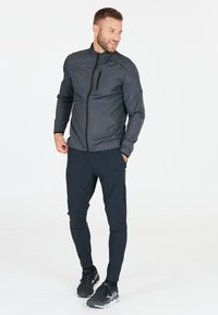 Endurance HUGOEE - Löparjacka - ombre blue