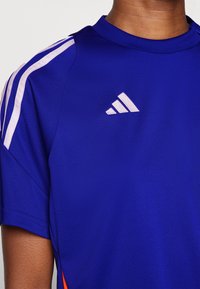 adidas Performance TIRO 24 JUMPSUIT - Overal - lucid blue/app solar red