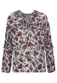 Blouse florale avec une base blanche ornée de motifs bleu marine, rouge et noir. Elle a des manches longues, un col froncé et un détail en œillet.