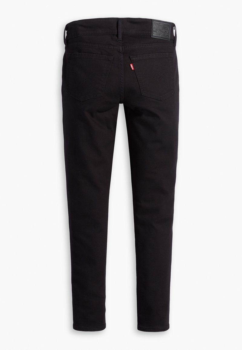 Schwarze Skinny-Jeans aus Baumwollgemisch. Verfügt über Gesäßtaschen und ein Lederpatch am Bund. Schlichtes Design, keine Muster oder Akzente.