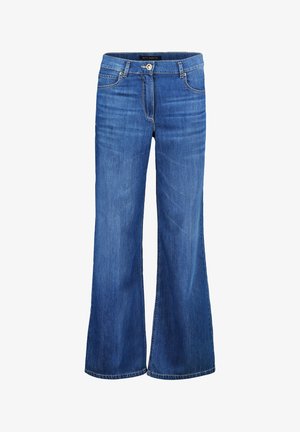 Blå denim jeans med vide ben, knaplukning, to forlommer og subtil falming. Afsluttet med lige kanten og standard syning.