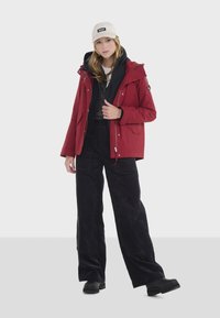 Aigle Krátky kabát - deep red