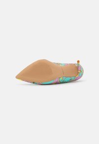 Multicolored flat shoe with a pointed toe; made of patterned fabric featuring pink, turquoise, and gold accents. Rubber outsole with textured grip.