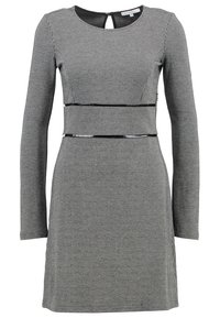 Langärmliges, tailliertes Kleid mit schwarz-weißer kleiner Karomuster, Rundhalsausschnitt und ausgeschnittenem Schlüsselloch-Detail im Rücken.