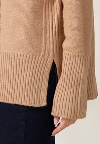 Oltre Sweter