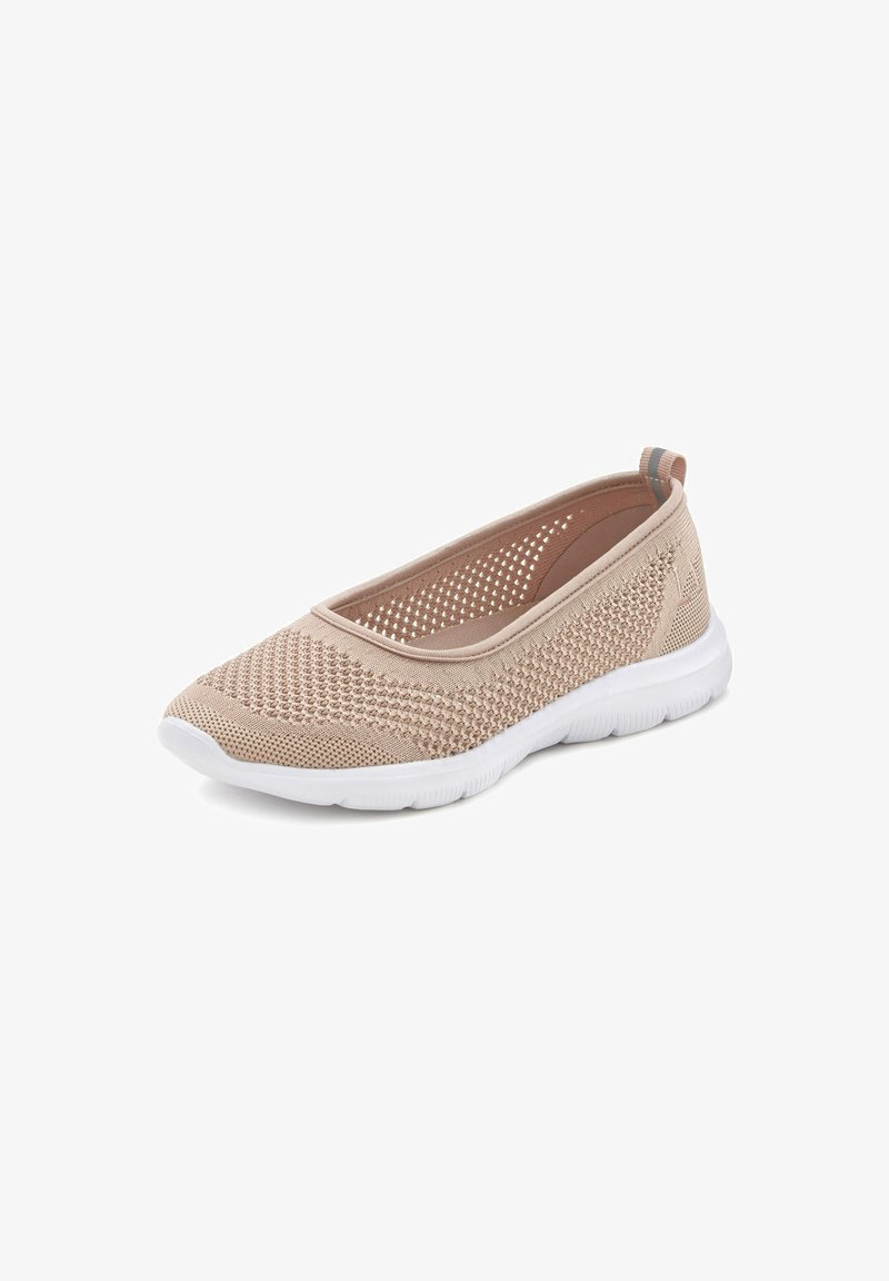 Beige knitted slip-on shoe with a breathable mesh upper, white rubber sole, and subtle striped accent on the heel for added detail.