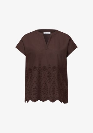 Blouse marron à manches courtes avec col en V, motifs floraux brodés et ourlet festonné.