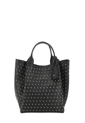 Black leather tote bag with dual handles, decorated with evenly spaced small gold studs and a hanging tag with brand name.