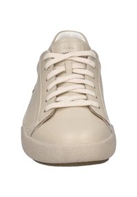 Beige leather sneakers with flat laces, padded collar, and textured rubber sole. Features minimalist design and subtle branding on tongue.
