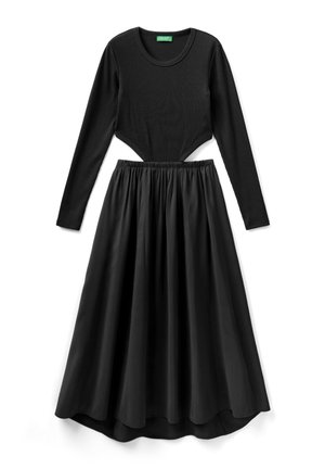 Czarny prążkowany body z długim rękawem i wycięciem w talii, zestawione z wysokim stanem i zwiewną spódnicą midi.