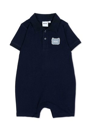 Tutina per neonati a maniche corte blu navy con colletto, due bottoni e una toppa grigia a forma di gatto con la scritta "BOSS" sul petto.