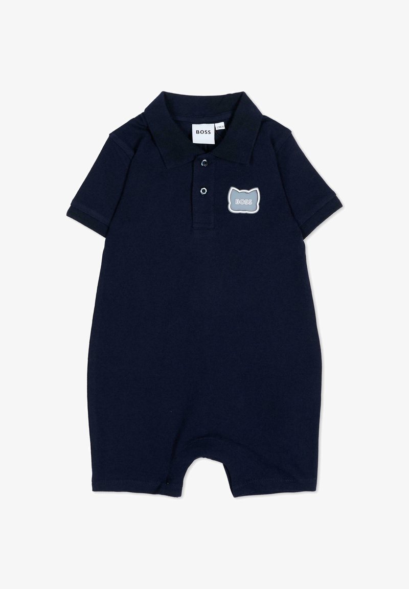 Grenouillère bébé bleu marine à manches courtes avec col, deux boutons et un patch en forme de chat gris avec le mot « BOSS » sur la poitrine.