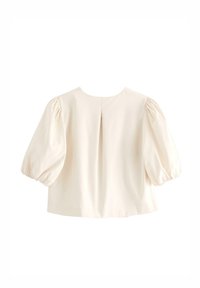 Cremefarvet bluse med pufærmer, en rund halsudskæring og rygfald. Lavet af glat stof med et rent, enkelt design.