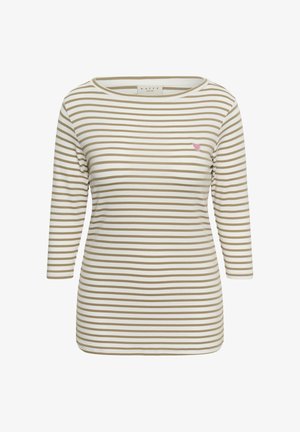 Béžové a bílé horizontálně pruhované tričko s dlouhým rukávem, kulatým výstřihem a malým růžovým srdíčkovým emblémem na levé straně hrudi.