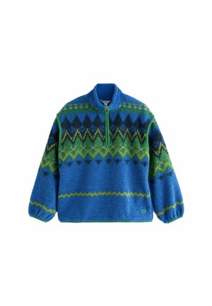Blå fleece-trøje med grønne og sorte zigzag-mønstre, halvlange lynlås foran, høj krave og elastiske ærmekanter.