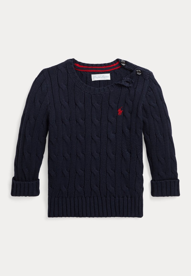 Ναυτικό πουλόβερ με πλέξη καλσόν και ριγωτά μανίκια και στρίφωμα, διαθέτει κόκκινες και μαύρες κουμπίδες στον ώμο και ένα μικρό κόκκινο λογότυπο στο στήθος.