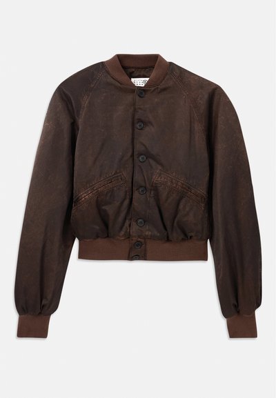 Brown bomber jacket featuring a shiny texture, raglan sleeves, ribbed cuffs and hem, and black button fastenings along the front.