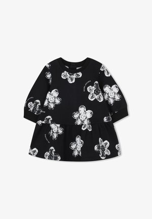 Abito nero con maniche lunghe, caratterizzato da una stampa floreale bianca e una gonna arricciata. Realizzato in un tessuto morbido con scollatura rotonda.