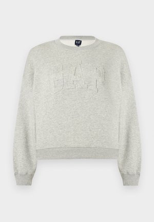 Sweat-shirt gris clair à col ras du cou avec "GAP" embossé sur la poitrine, poignets et ourlet côtelés, présenté sur un fond blanc.