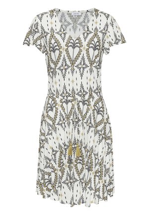 White knee-length dress with black and gold abstract leaf patterns, short sleeves, V-neck, and a waist tie with tassels.
