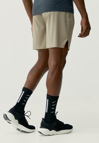 Born Living Yoga Sportiniai šortai - beige