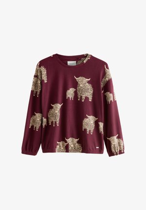 Weinrotes Langarm-Sweatshirt mit Rundhalsausschnitt, das ein wiederholtes beiges Highland-Rind-Muster zeigt. Mit elastischen Manschetten und lockerer Passform.