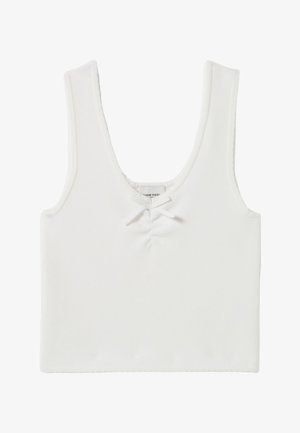 Haut court blanc sans manches avec encolure dégagée et petit nœud décoratif à l'avant au centre.