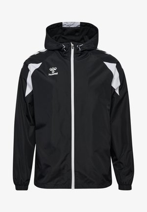 Czarna i biała sportowa kurtka z kapturem, zamek błyskawiczny z przodu, elastyczne mankiety oraz logo Hummel na piersi.