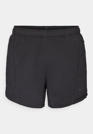 Shorts de sport noirs en tissu léger, dotés d'une taille élastique, de coutures latérales et d'un petit logo sur le bas.