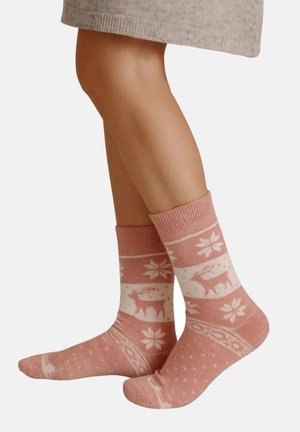 Rosa gemusterte Socken mit weißen Motiven von Rehen und Blumen, ausgestattet mit einem gerippten Bündchen und einer weichen, gestrickten Textur.