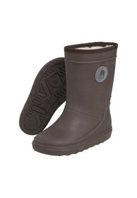 Bottes en caoutchouc marron avec une doublure intérieure douce, un bout rond et une semelle texturée avec un logo circulaire sur le côté.