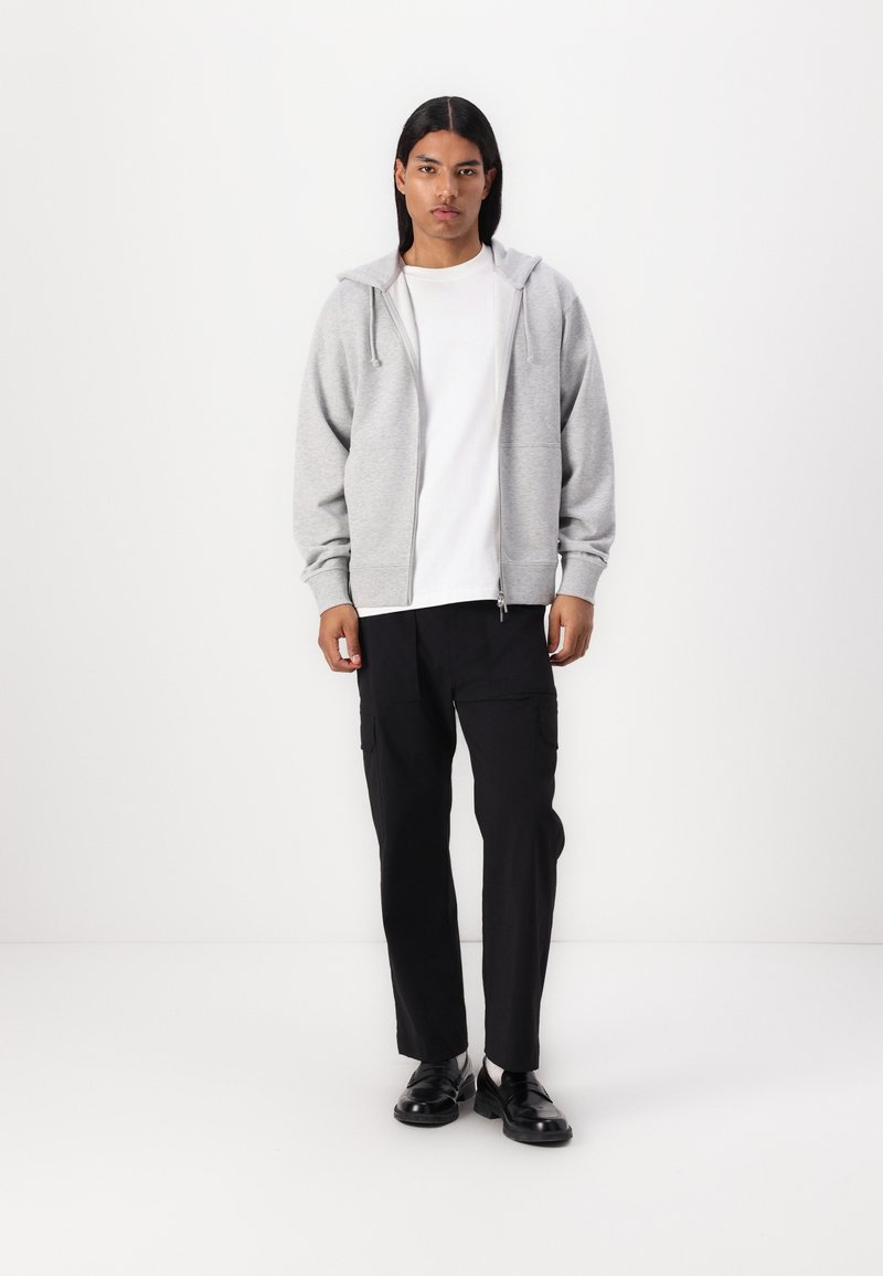 Sweat à capuche oversized à manches longues, imprimé à message au dos