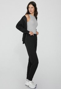 Tezenis Jogginghose - schwarz black