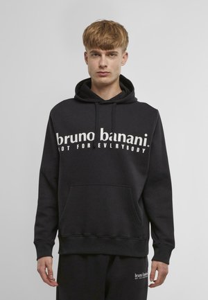 Crna dukserica od mješavine pamuka s kenguruvim džepom, koja ima bijeli natpis "bruno banani. NIJE ZA SVE" preko prsa.