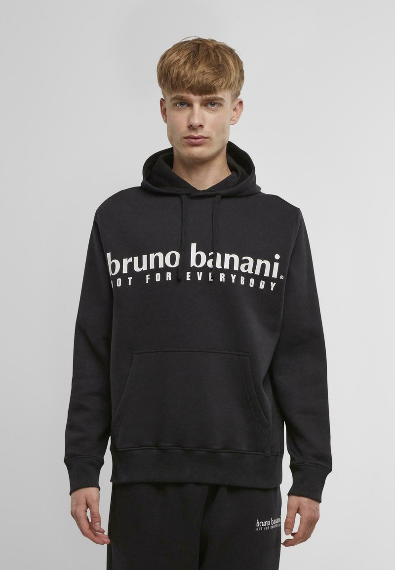 Sudă neagră dintr-un amestec de bumbac, cu un buzunar tip kangaroo, având text alb "bruno banani. NOT FOR EVERYBODY" pe piept.