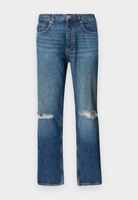 Μπλε τζιν παντελόνι με ίσια γραμμή, φθορές με σκισίματα και στα δύο γόνατα, κούμπωμα με κουμπιά μπροστά και σχέδιο με πέντε τσέπες.