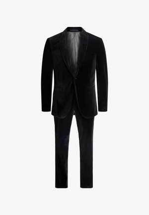 Black velvet suit with a single button closure, notched lapels, and two side pockets. Trousers feature straight legs, matching fabric.