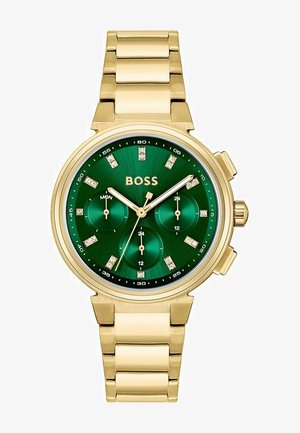 Gold-tone metal watch with a green dial, three subdials, studded hour markers, and a linked bracelet. Features BOSS branding.