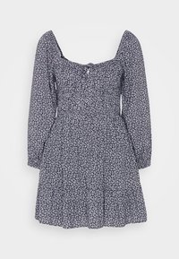 Námořnický modrý květinový overal s dlouhými nabíranými rukávy, čtveratým výstřihem, vázaným tělem a splývavou sukní se vzory bílých květin.