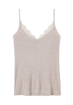 Camisole beige clair avec des bretelles fines et un décolleté en V, présentant une finition en dentelle texturée le long du col. Tissu doux avec une coupe décontractée.