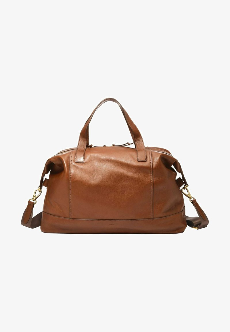 Sac de sport en cuir marron avec deux poignées supérieures, une bandoulière amovible et des éléments en métal doré. Texture lisse et design minimaliste.