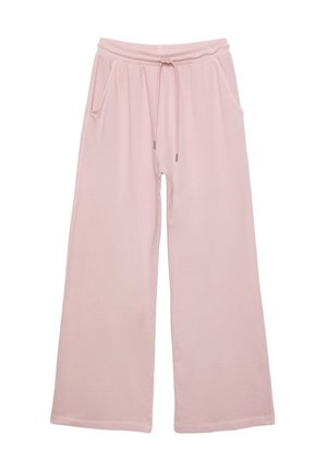 Pantalons de jogging larges rose clair avec ceinture élastique, lien de serrage et poches latérales, posés à plat sur un fond blanc.