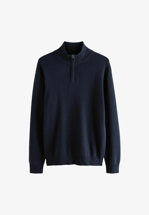 Pull-over tricot bleu marine avec un col côtelé haut, une fermeture éclair à mi-hauteur à l'avant, des manches longues, et des poignets et un ourlet côtelés. Texture lisse, design minimaliste.